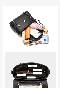 Detailed view of black litchi pattern handbag internal multi-compartment storage space
