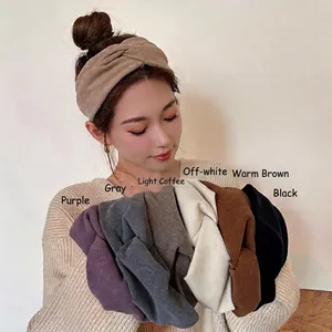 Breathable wide knitted twist headband for women, available in various solid colors