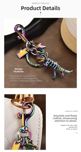 Detail of colorful rainbow dinosaur skeleton keychain on premium leather and bag