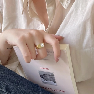 Elegant 925 silver gold-plated ring featuring a large rectangular crystal and engraving