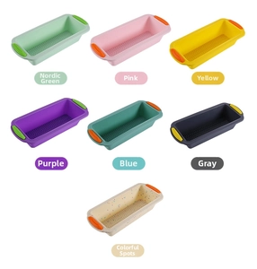 Detail showing seven colorful rectangular silicone bread pans with non-stick wavy bottom texture