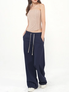 Minimalist low-waist drawstring wide-leg sweatpants and slim tube top on model