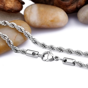 Macro shot of silver titanium twist rope chain necklace featuring a secure lobster clasp