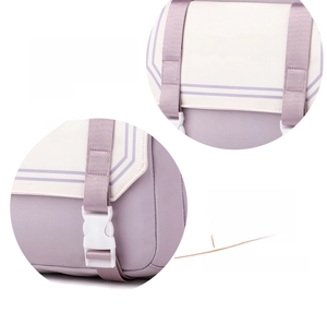 Detail of lavender and cream school backpack with 'beautiful' text and durable strap buckle