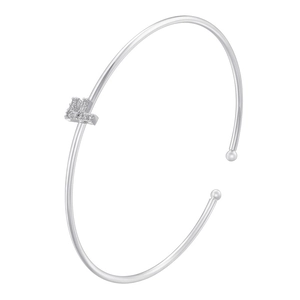 Close-up of silver adjustable bangle with zircon-studded letter L and ball ends