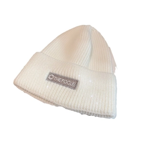 Chic cream white knitted beanie hat with embroidered label for winter warmth