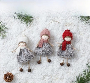 Detail of Christmas angel hanging ornaments with plush grey fleece skirts and bells