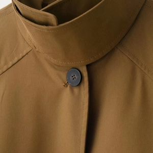 Fashionable khaki mid-length windbreaker jacket featuring twill fabric and button detail