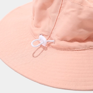 Pink wide brim sun hat with adjustable drawstring and toggle for outdoor wear