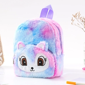 Close-up of tie-dye plush backpack featuring cartoon embroidery and soft 3D animal ears