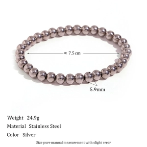 Macro shot showing 5.9mm silver stainless steel beads and 24.9g weight specifications