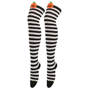 Detail view of Halloween over-knee socks with black stripes and orange pumpkin decor