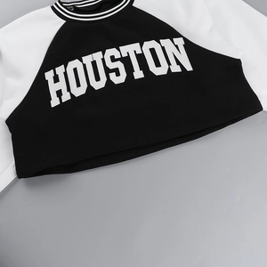 Detail of Houston print on black and white cropped baseball sweatshirt with striped collar