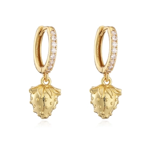 Macro detail of gold strawberry earrings featuring cubic zirconia pavé and 18K plating