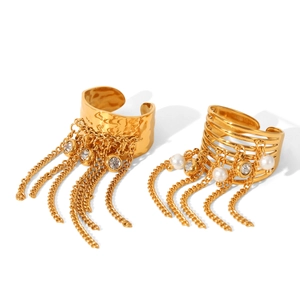 Golden tassel rings with pearls and zirconias shown on a clean white background