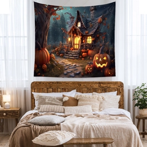 Detail of Halloween tapestry with spooky forest and glowing pumpkins in a cozy bedroom