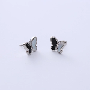 Silver butterfly stud earrings with black and white wings in polished titanium steel