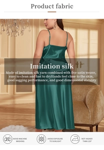Close-up of emerald imitation silk fabric showing smooth satin texture and drape