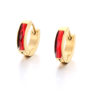 Elegant gold earrings with red rectangular zircon stones on a clean white background