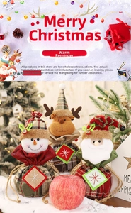 Three Christmas drawstring gift bags featuring snowman, reindeer, and Santa Claus patterns