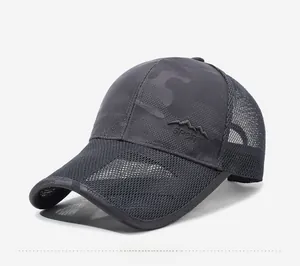 Close-up of dark grey camouflage mesh cap with mountain and Sport embroidery detail