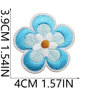 Detailed embroidery texture of a blue five-petal flower patch with size dimensions