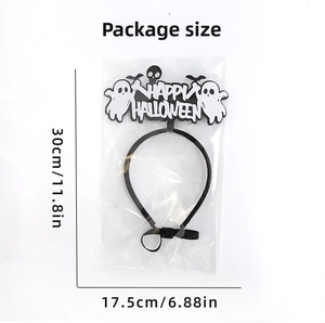 Detail of Halloween pet headband with ghost and skull motifs in clear plastic packaging