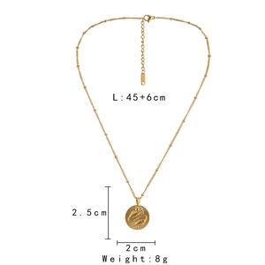 Detailed view of golden coin pendant necklace with dimensions 45cm chain and 8g weight