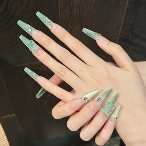 Mint green coffin press-on nails with marble texture, butterfly charms and 3D rhinestones