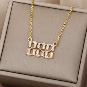 Gold-plated 2020 number pendant necklace with sparkling cubic zirconia on jewelry box