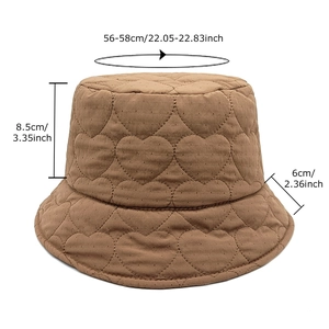 Brown quilted bucket hat with heart stitching and size specs for winter warmth