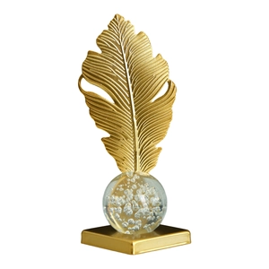 Modern Nordic crystal ball with golden feather metal stand and luxury square base