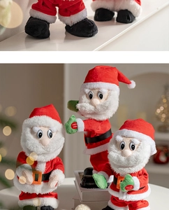 Detail showing the green 'PRESS HERE' button on the singing dancing Santa Claus plush toy