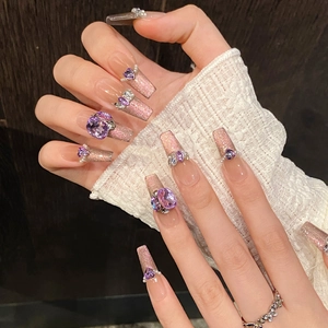 Pink and purple gradient coffin press-on nails with cat eye effect and crystal accents
