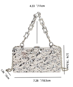 Silver textured evening bag dimensions: 7.28" x 3.74" x 1.96" with chain strap