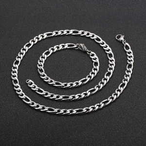 Polished silver Figaro chain necklace and bracelet set with secure lobster clasp