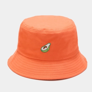 Close-up of orange cotton bucket hat featuring detailed avocado embroidery on front