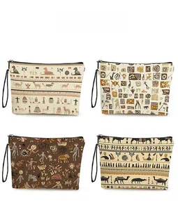 Detail display of four cosmetic bags with Egyptian and camel ethnic patterns on canvas