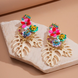 Tropical style leaf earrings with colorful sequins and floral design on stone