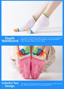 Detailed view of non-slip silicone grips and rainbow toe separators on yoga socks