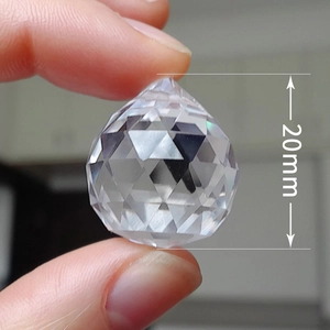 Macro shot of 20mm faceted clear crystal prism ball for DIY decor and jewelry