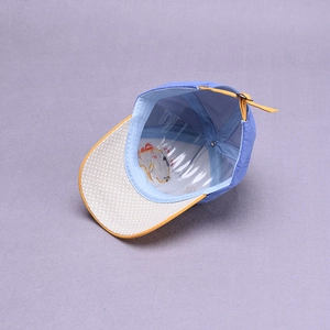 Kids dinosaur baseball cap in blue and beige with adjustable strap for sun protection
