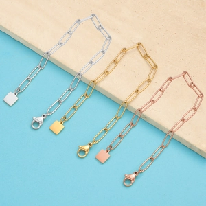 Three-color paperclip link bracelets in gold, silver, and rose gold with lobster clasp