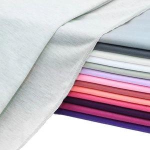 Jersey cotton long headscarf in multiple colors stack showing stitching detail