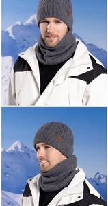Detail view of thick cable knit winter hat and neck warmer set in charcoal grey finish
