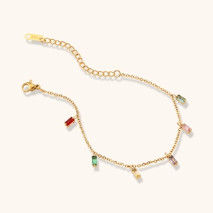Detail of 18K gold chain bracelet with six colorful rectangular zircon stones and lobster clasp