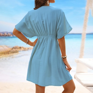 Close-up of light blue ice silk beach cover-up with elastic waist and lace details