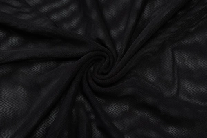 Close-up of black sheer mesh fabric showing detailed texture and natural draped patterns