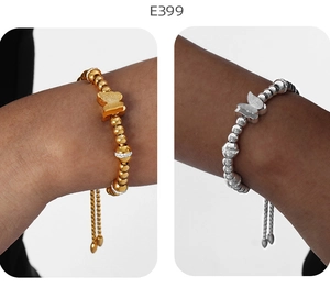 Détails du bracelet à billes papillon ajustable avec finitions dorées et argentées