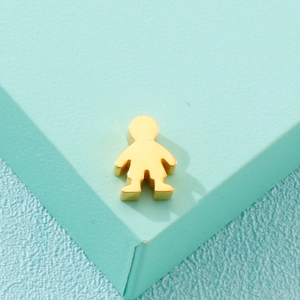 Polished 18K gold-plated stainless steel boy figure pendant on a light green stand